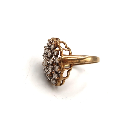  A 9ct gold brilliant cut diamond openwork cluster ring. Size M. Weight 3.60 grams.