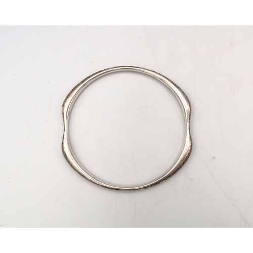  A Georg Jensen silver bangle. Stamped 155. Weight 29.60 grams.