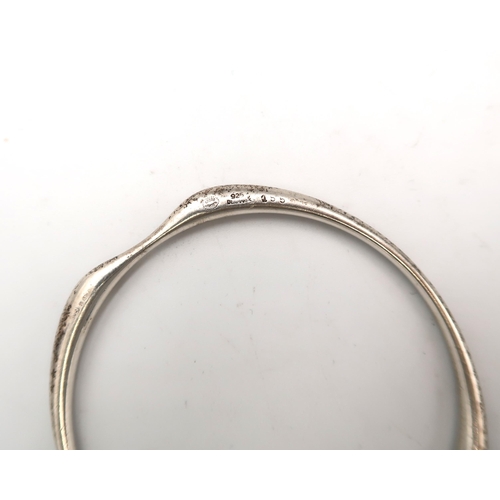  A Georg Jensen silver bangle. Stamped 155. Weight 29.60 grams.