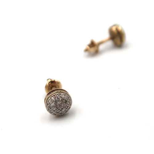  A pair of pave set diamond circular studs. Stamped 375. Weight 1.22 grams.