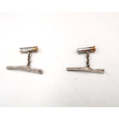  A pair of silver shot gun chain link cufflinks. Weight 13.16 grams