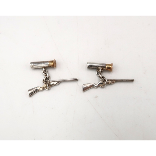  A pair of silver shot gun chain link cufflinks. Weight 13.16 grams