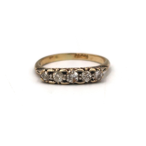 10 - A brilliant cut diamond five stone ring. Estimated total weight 0.50ct. Stamped 18ct. Size R. Weight... 