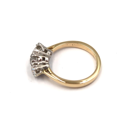 100 - An 18ct yellow gold three stone old cut diamond ring - centre stone approx 0.65ct - total diamond we... 