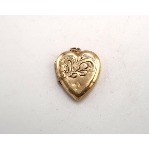 115 - A 9ct hallmarked yellow gold heart shaped locket, approx 2.4 grams