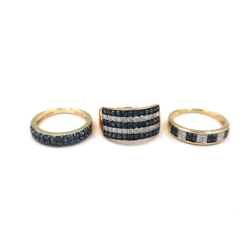 123 - Three 9ct gold rings. To include a two row irradiated blue brilliant cut diamond ring. Stated diamon... 