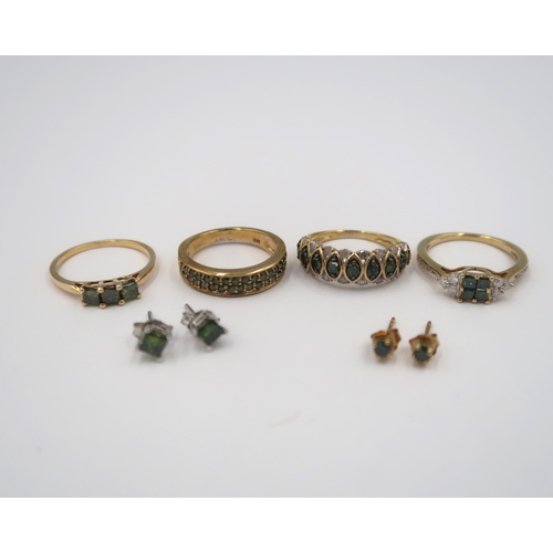 133 - Six pieces of 9ct green diamond jewellery. To include a princess cut diamond three stone ring. State... 