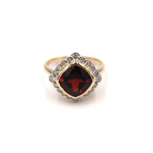 138 - A 9ct yellow gold Art Deco style garnet and diamond ring - diamonds are well matched, bright and liv... 