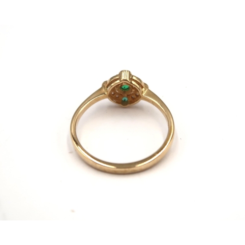 139 - A 9ct yellow gold Art Deco style emerald and diamond ring - emeralds and diamonds are well matched -... 