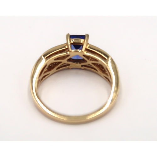 140 - An 18ct yellow gold tanzanite and diamond ring - tanzanite is approx 1.75ct and a very good colour, ... 