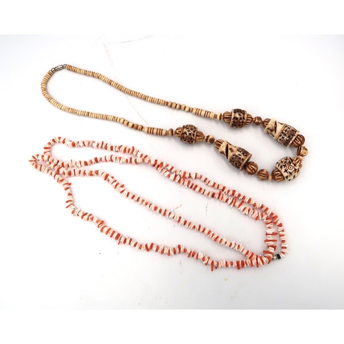 142 - Two necklaces - a hand carved bone necklace approx 90cm long and a natural coral necklace approx 120... 