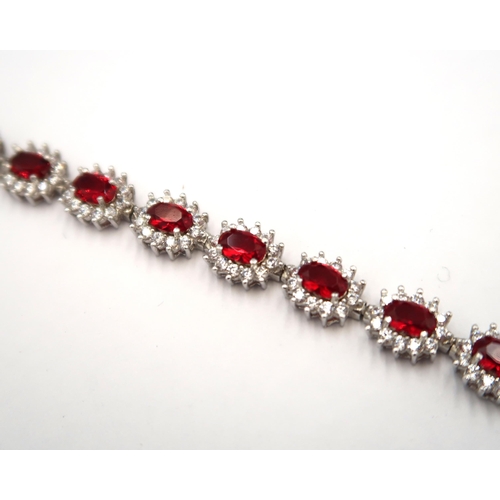 145 - A silver 925 synthetic ruby and diamond bracelet - length 18cm