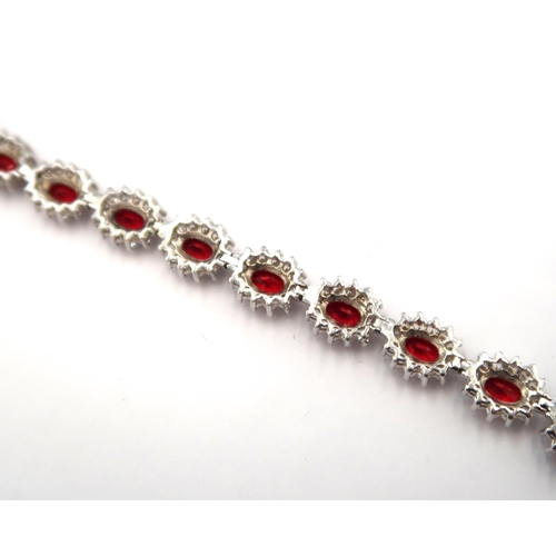 145 - A silver 925 synthetic ruby and diamond bracelet - length 18cm