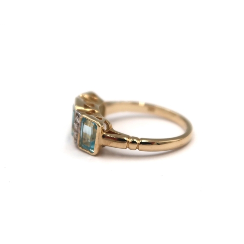 147 - A 9ct yellow gold Art Deco style three stone aquamarine and diamond ring - aquamarine and diamonds a... 