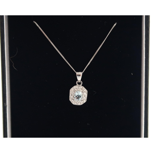 150 - A 9ct white gold Art Deco style aquamarine and diamond pendant on a 9ct white gold chain - head size... 