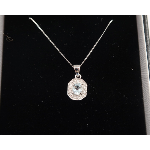 150 - A 9ct white gold Art Deco style aquamarine and diamond pendant on a 9ct white gold chain - head size... 