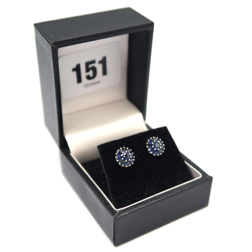 151 - A pair of 9ct yellow gold diamond cut sapphire earrings - the sapphires are well matched and a good ... 