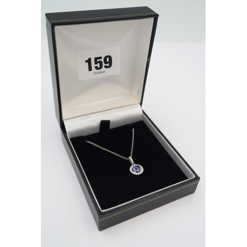 159 - A quality platinum sapphire and diamond pendant on a platinum chain - sapphire and diamonds are a go... 