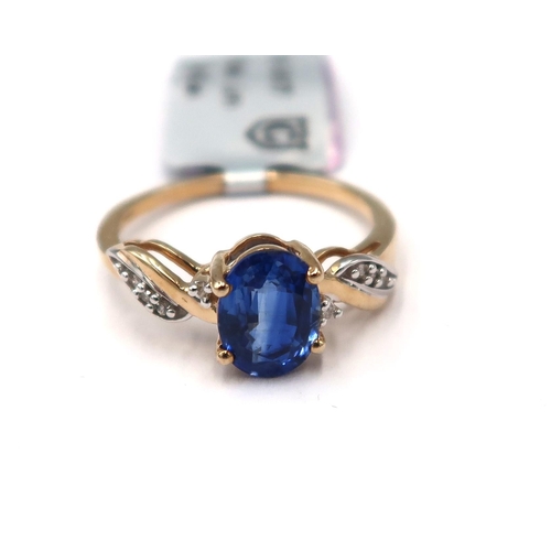 171 - A 9ct gold oval kyanite ring with single cut diamond shoulders. Size O. Weight 2.31 grams.