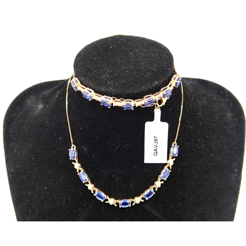 172 - A 9ct gold oval kyanite and single cut diamond necklace and bracelet set. Weight 12.41 grams