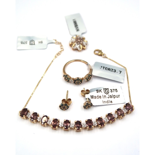 175 - Four pieces of 9ct gold Miova Loko garnet jewellery. To include a pair of cluster ear studs. A ring ... 