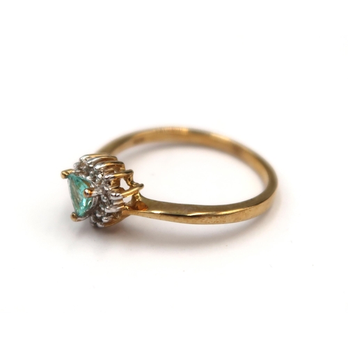 186 - A 9ct gold trilliant cut Paraiba tourmaline and brilliant cut diamond cluster ring. Size N 1/2. Weig... 