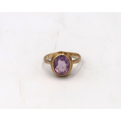 199 - A vintage 9ct gold and amethyst set dress ring, size L, 2.5g.