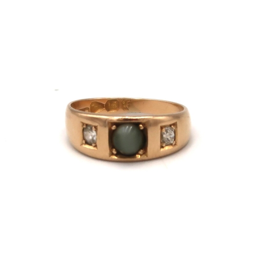 203 - A 9ct gold, diamond and tiger's eye ring, size H, 2,9g.