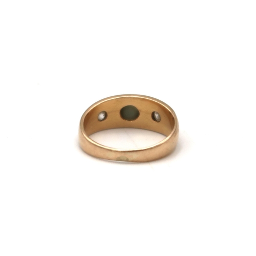 203 - A 9ct gold, diamond and tiger's eye ring, size H, 2,9g.