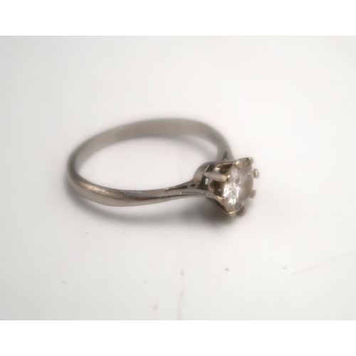 205 - A Platinum diamond solitaire ring size O - approx weight 2.9 grams - the single round cut diamond ap... 