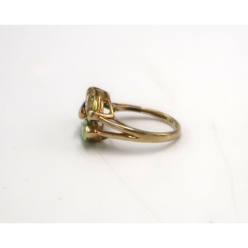 206 - A 9k gold marked dress ring, with citrine, peridot, and diopside to the shoulder, size K, 2.7g.