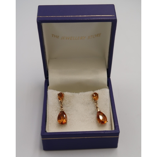 208 - A pair of 9ct gold and citrine drop earrings, hallmarked.