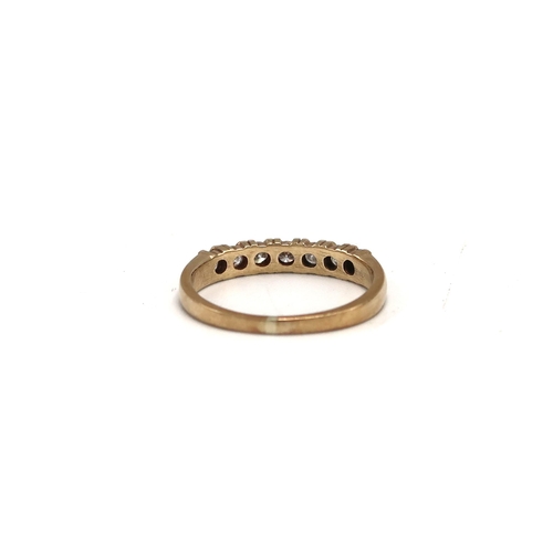 209 - A 9ct gold half eternity ring, set with 0.33ct diamonds, hallmarked, size K, approx weight 1.6g