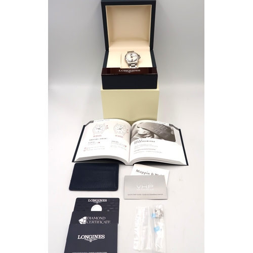 256 - A Longines Conquest V.H.P wristwatch in stainless steel case on bracelet strap - boxed with paperwor... 