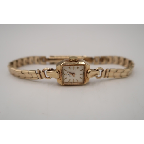 274 - A lady's vintage Bucherer dress watch, in 14ct gold case the rectangular signed dial with baton nume... 