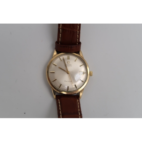 281 - An Omega 1968 solid 9ct gold automatic men's watch, ref 161.25418, working in saleroom and with box