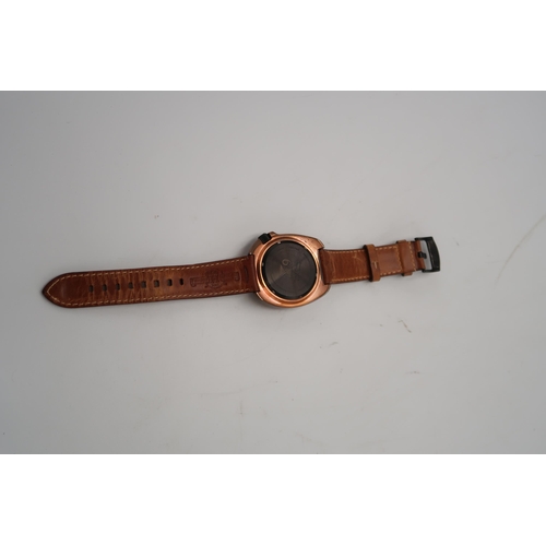 291 - A TC9 Turtle divers watch in brass case with brown leather strap, burgundy dial with baton markers, ... 