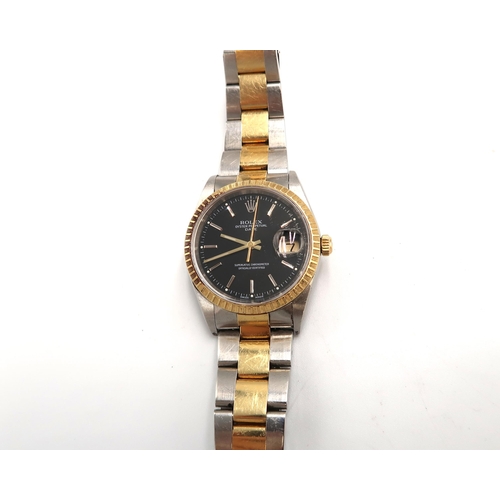 296 - A Rolex Oyster Perpetual Date wristwatch, the black dial with baton markers date aperture at 3 o'clo... 