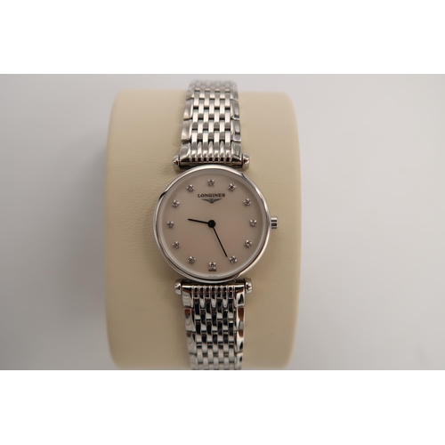 297 - A lady's Longines wristwatch, La Grande Classique with diamond set mother of pearl dial, model No L4... 