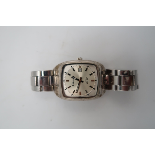 301 - A gentleman's stainless steel cased watch by Chevy, with silvered dial, baton markers and date apert... 