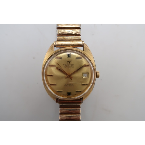 302 - A gentleman's True Time automatic gold plated wristwatch with matching bracelet strap, the gold colo... 