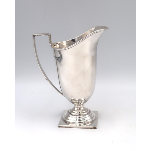 327 - A silver hallmarked milk jug, J Deakin Sheffield, 4.65 troy oz, in good bright condition