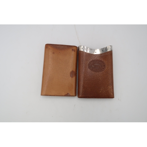 329 - A leather and silver hallmarked mounted cigar case