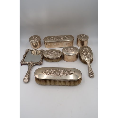 332 - A Continental Austrian silver dressing table set consisting of clothes brush, three trinket pots, ha... 