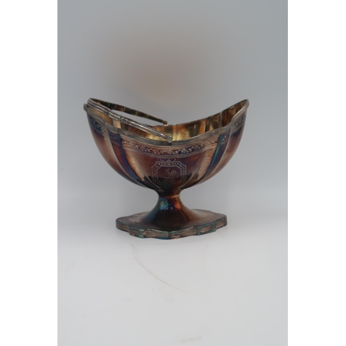 334 - A silver hallmarked George III 1793, Thomas Olyphant, London, boat shaped sugar basin with handle, e... 