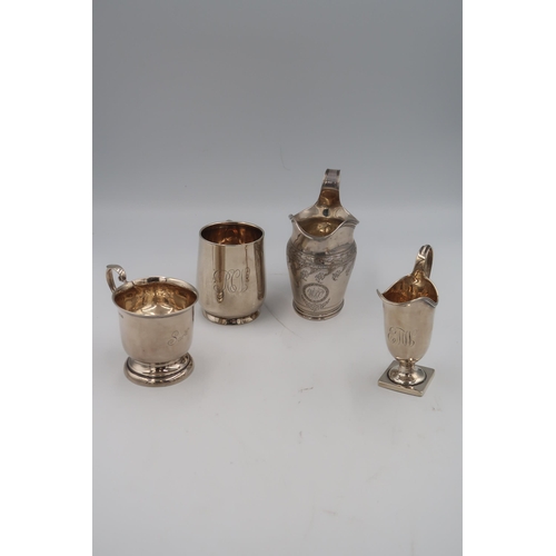 344 - Four Silver H.M. vessels including Milk jugs and tankards the earliest being London 1796. 13.25 troy... 