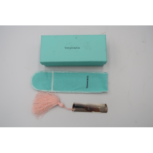 346 - A Tiffany Christening comb, complete with original pink tassle, Tiffany cloth bag, box and paper bag... 