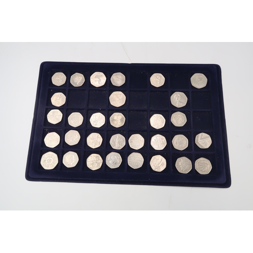 373 - A case containing five pence coins from 1953 to 2007 and 1955 -2020,  fifty pence coins from 1969 to... 