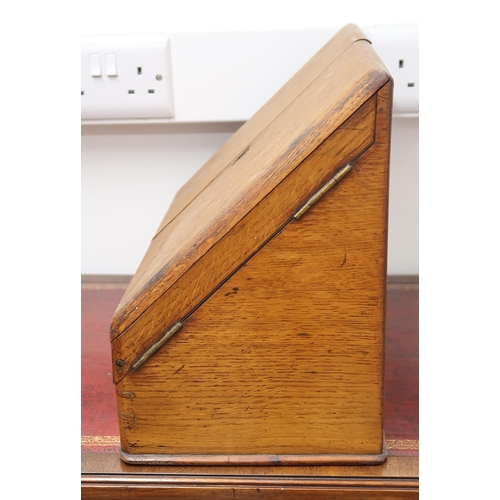 431 - An oak cased early 20th century correspondence box, two doors over drawer.