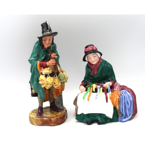 434 - A Royal Doulton figure HN2103 The Mask Seller, 22cm high in good condition, no sign of damage or los... 